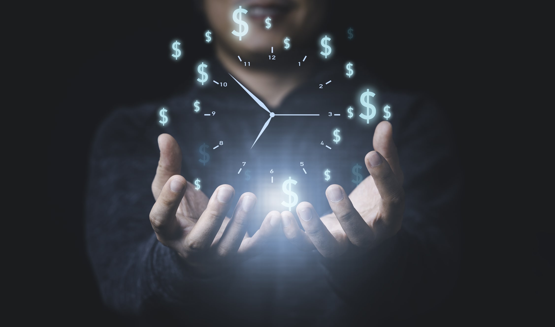 Businessman holding virtual clock