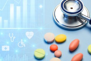 Healthcare business graph and data of medical business growth and a stethoscope with multi colored pills