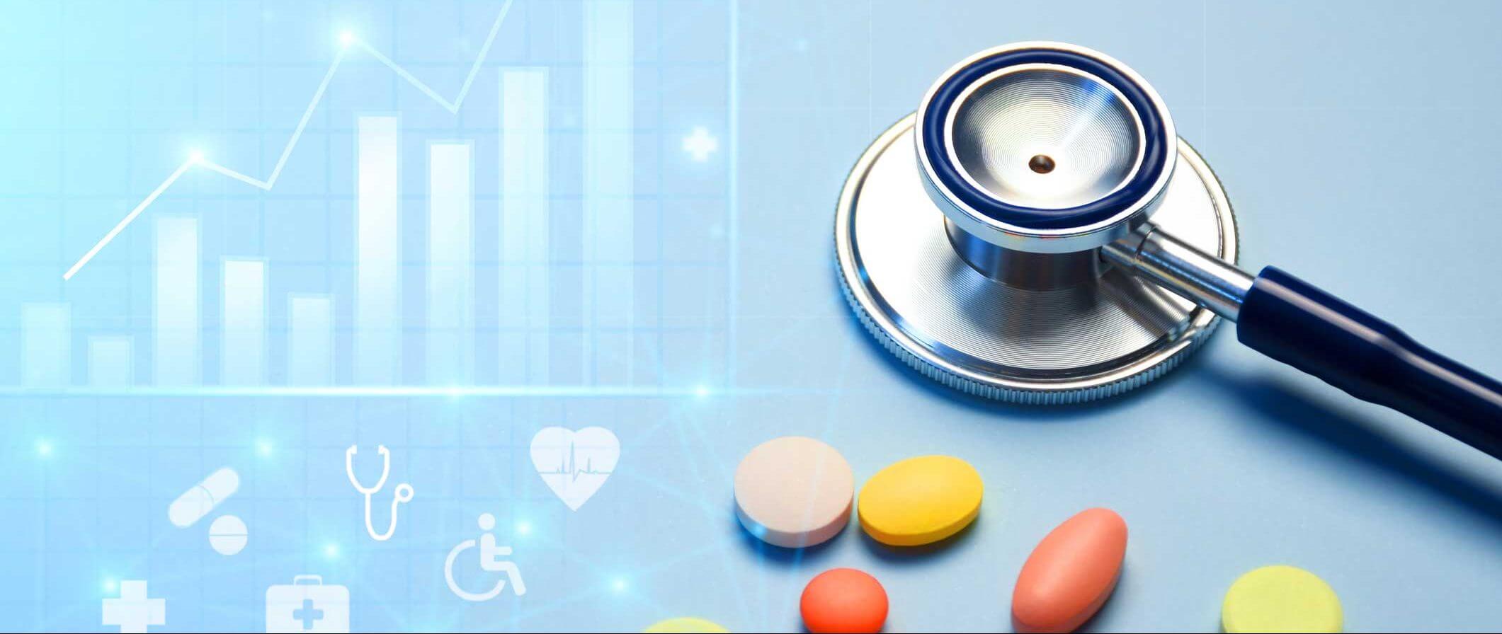 Healthcare business graph and data of medical business growth and a stethoscope with multi colored pills